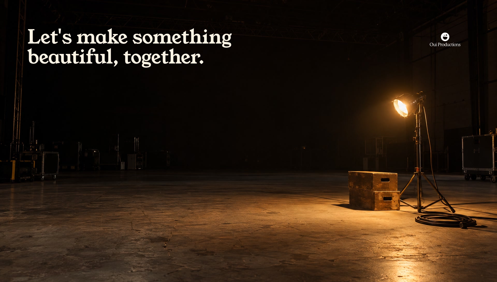 Key art: an empty stage with one work light